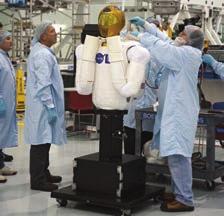 Robots Spur Software That Lends a Hand NASA Technology Robonaut 2 flew aboard Space Shuttle Discovery to the International Space Station (ISS) in early 2011, but its development has been many years