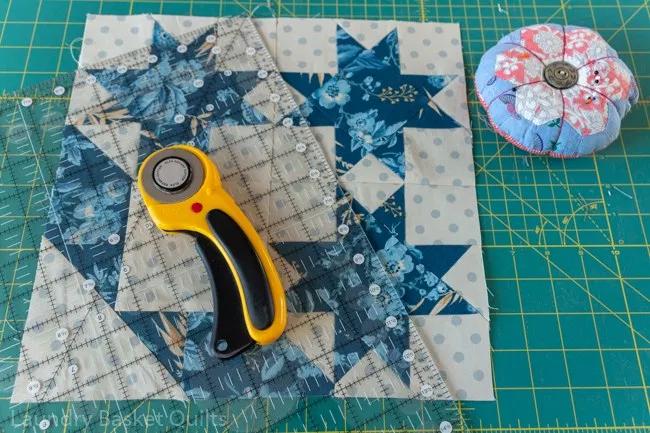 Sew it together, press and trim to 12-1/2 x 12-1/2.