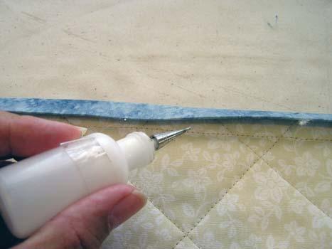 Now I like to use Roxanne s Blue Baste to hold my binding in place for hand sewing. No pins to stick you. 22. Hand sew your binding and enjoy the quilt.