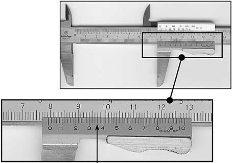 27 2009 VCE VET ENGINECII EXAM When milling, you will use the tool shown in Figure 6 to measure the length of the slots. Figure 6 l. i. What is the name of the measuring tool shown? ii.