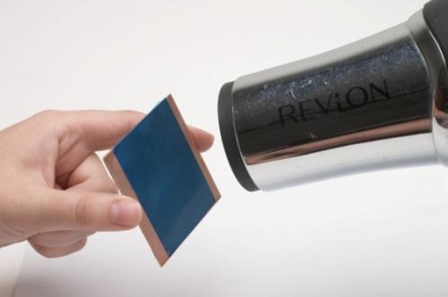Place the UV-30 film onto the surface of the metal and use a credit card to squeegee the film down smoothly.