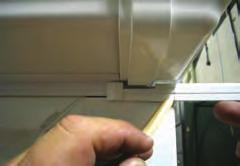 Measure and cut the trim so that it fits between the gutter unions, stop ends or both.