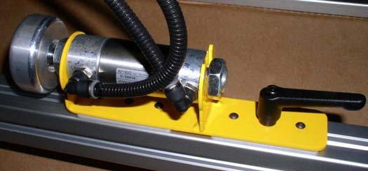 The below listed items consist of cylinders clamping the material back against the fence or over center cylinders clamping the material against the table top, or a combination of both.