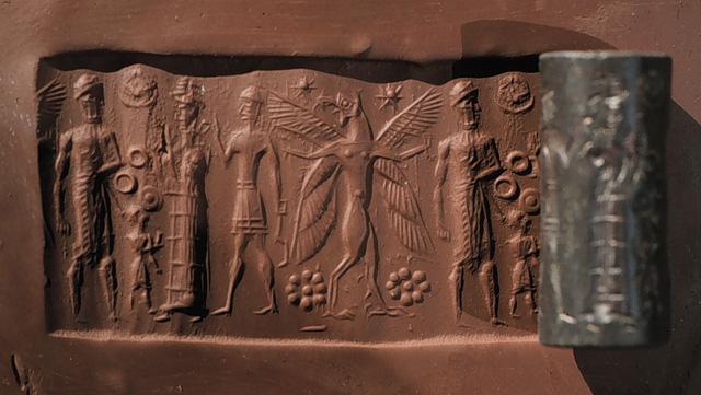 Hematite cylinder seal from Mesopotamia, carved during the Old Babylonian