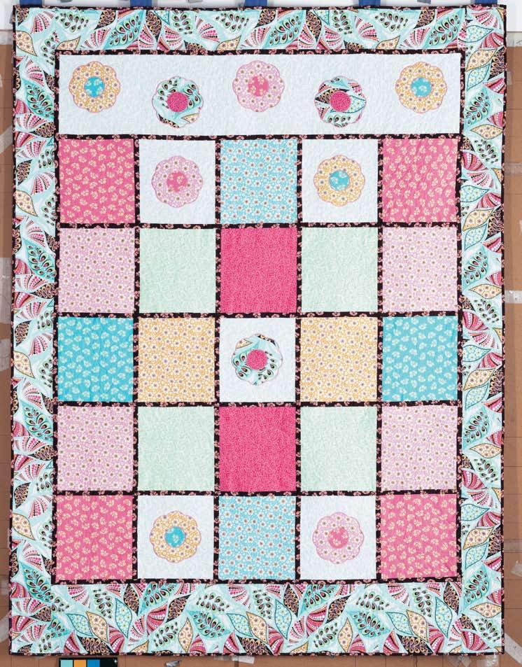 You can make this quilt in no time with big blocks and easy appliqué. It s the perfect project to feature large pieces of favorite fabrics.