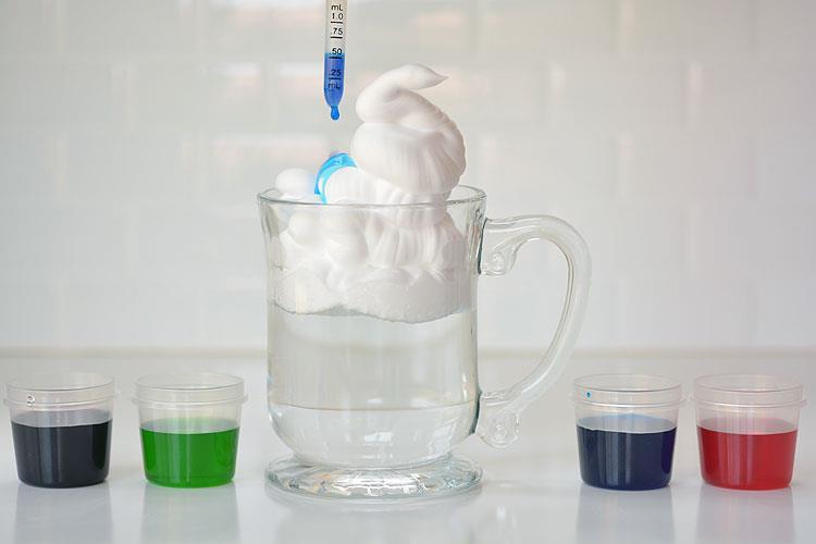 the different colours of water onto the shaving cream cloud.