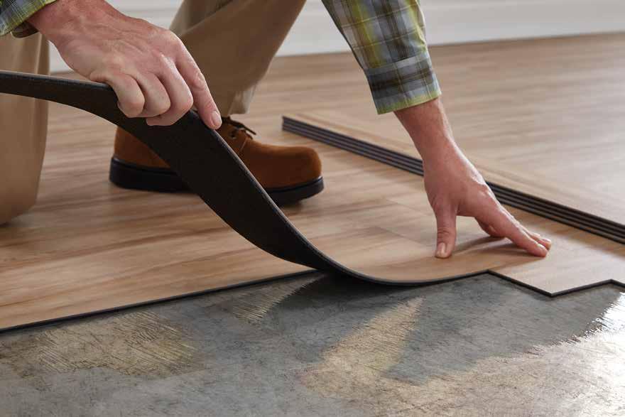 Each plank is composed of 2mm thick LVT affixed to a 3mm thick recycled rubber underlayment.