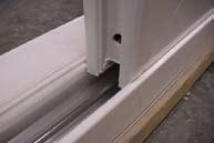 NOTE: Remove roller track from the sill before pre-drilling the screw holes to prevent accidentally drilling completely