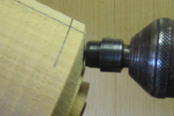 A bevel is made on each end for better grip on the second axis. Fig 2 shows how the tail center matches the bevel.