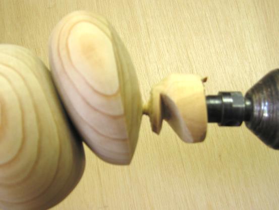 The two figures below show the base that is cut and the top that is down to 1/8 inch. These can be separated off the lathe with a saw or sharp knife.