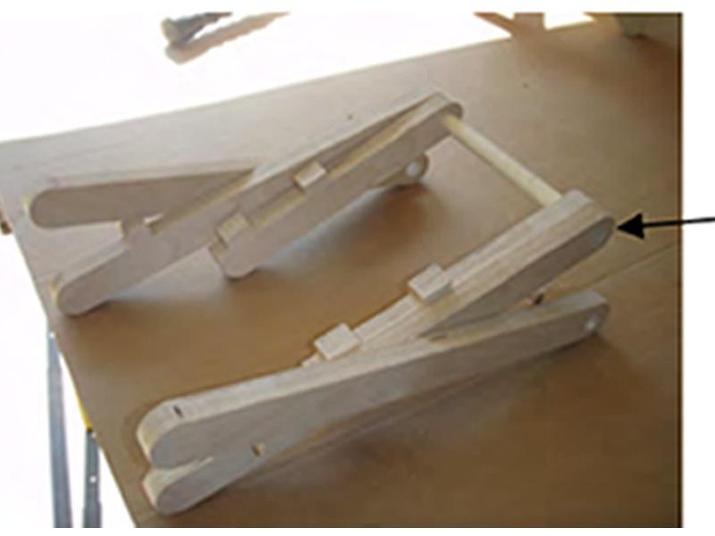 ( See image 1 ) 11. Push the leg assemblies into each side of the center top supports.