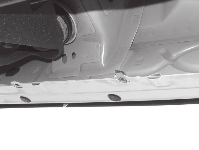 Directly above each tab is a top mounting location on the side of the body panel.