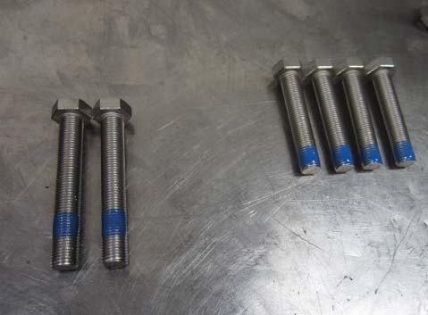 32. Take four of the 3/8 x 2 bolts as well as the two 3/8 x 2 1/2