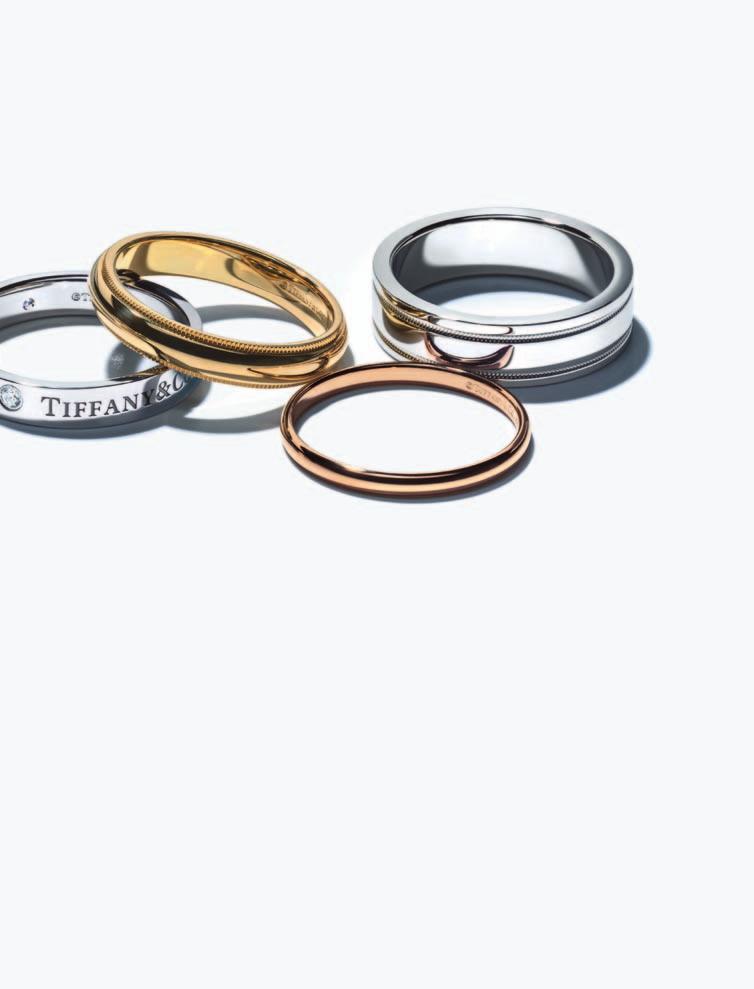 WEDDING BANDS, FROM LEFT: TIFFANY CLASSIC IN PLATINUM, TIFFANY CLASSIC MILGRAIN IN PLATINUM, TIFFANY CLASSIC IN PLATINUM AND 18K YELLOW GOLD, TIFFANY