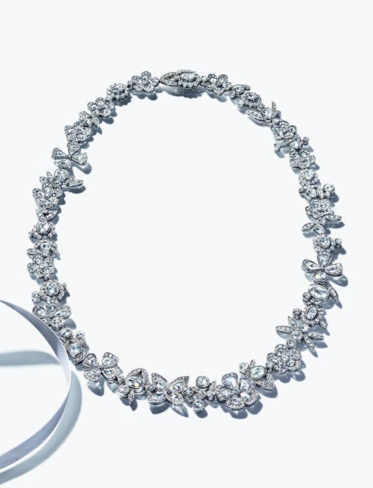 RARE BEAUTY An extravagant diamond necklace adds grandeur to this once-in-a-lifetime occasion