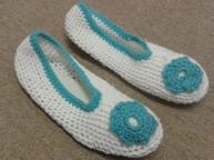 Ultra-Soft Crocheted Slippers submitted by Sue For this project you will need: 1 Pair of Insoles (bought cheaply from pound land - 1 a pair) 1 Ball Cotton (100%) 1 Size 4 Crochet Wool Small oddments