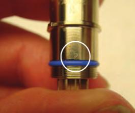 Using the pin numbers engraved on the connector piece as a guide (Figure 18), insert each contact