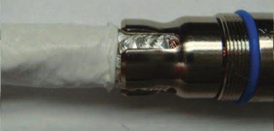 With your fingers or needle-nose pliers, push the outer jacket as close as possible to the connector (Figure 39).
