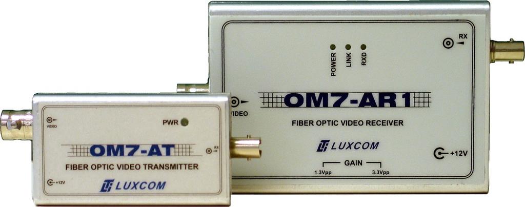 Description The OM7AT transmitter accepts an IRIG electrical timing signal and transmits it over a multimode fiber to an OM7AR1 where it is output electrically.