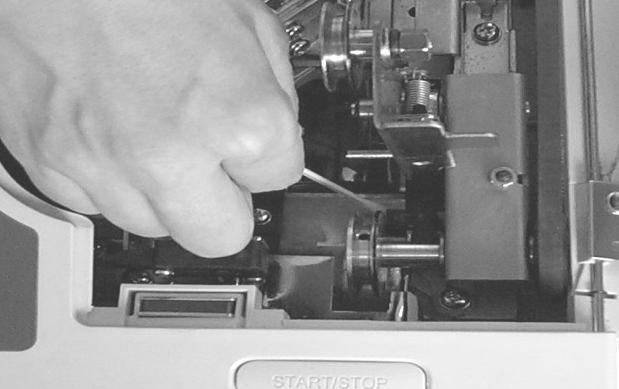 Troubleshooting Coin Runway Jamming: When coins are jammed in the coin runway of the machine, rotate the diameter knob counter-clockwise to release the left guide plate.