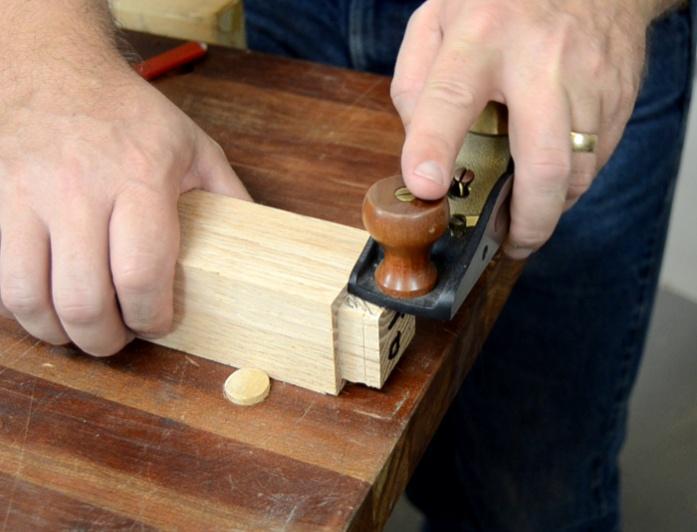 The shoulders are cut 1/4" deep by 3/4" wide on all four faces. An accurate and stable miter gauge, like my Osborne EB3, ensures that the shoulders are square.
