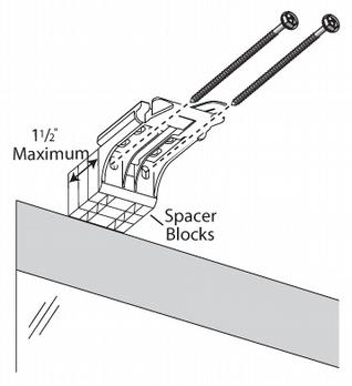 If your installation requires the use of spacer blocks, attach them and the installation brackets to your mounting surface using #6 screws