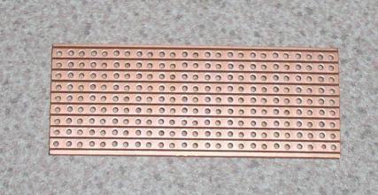A suitable piece of veroboard is used. This must be large enough to hold all the components of the circuit.