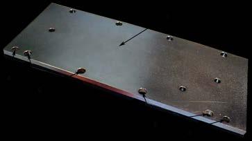 The magnetic plates exert a strong attractive force on all ferromagnetic metals such as iron.