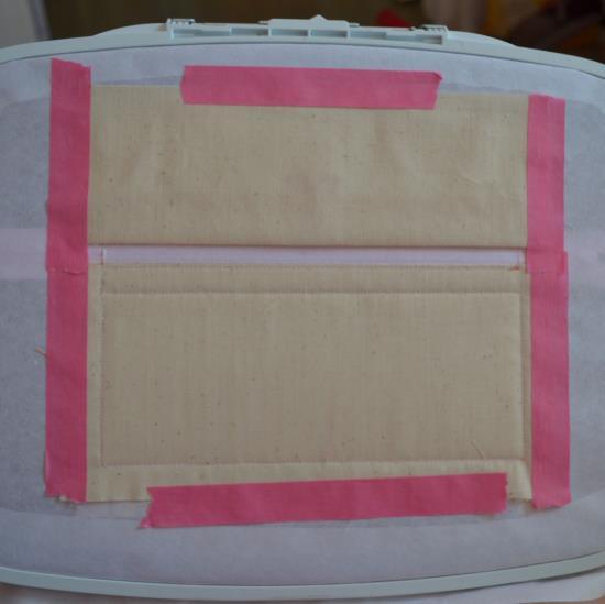 With the fold of Fabric H toward the bottom of the project, place the fold slightly