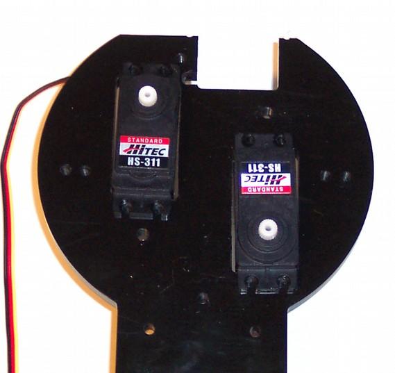 Place the Centered Servos (5) into the Servo Plate (2) as shown.