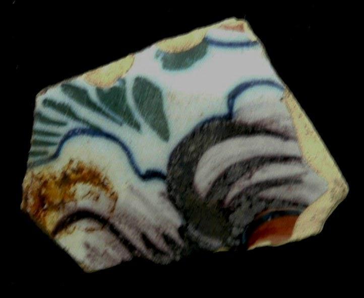 21 (No 7-43) 1139 Bowl 1 96 One thickly potted tinglazed earthenware shard from a large polychrome bowl decorated on its exterior with what