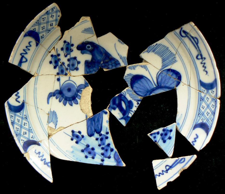 1720.. (No 7-7) 1139 Plates 5 180mm & 62 Five tin-glazed earthenware shards of which two and two conjoin from two smallish Dutch plates glazed on both surfaces