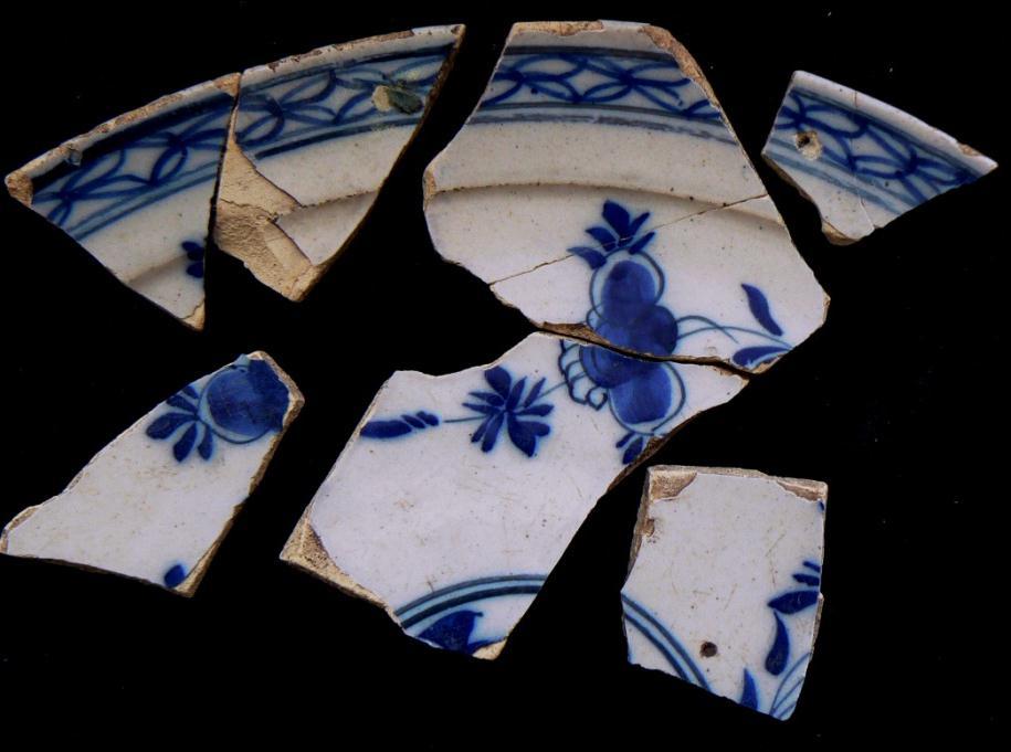6 (No 7-10) (Also conjoining shards from (1132) 1152 Plate 9 220mm & 65 Nine tin-glazed earthenware shards of which three and two conjoin from a plate with