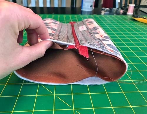 Fold the strip in half lengthwise (so it is now 1½" x 8") wrong sides together and press