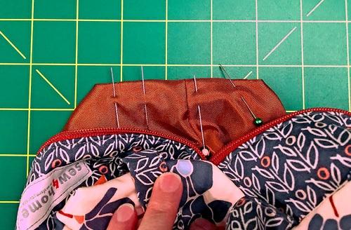 10. To finish the edge of this last unsewn corner, turn both raw