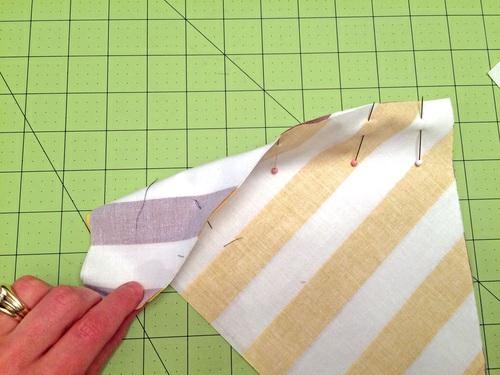 As with Pillow A, very carefully align the stripes. Pin in place. 3. Using a ¼" seam allowance stitch together.