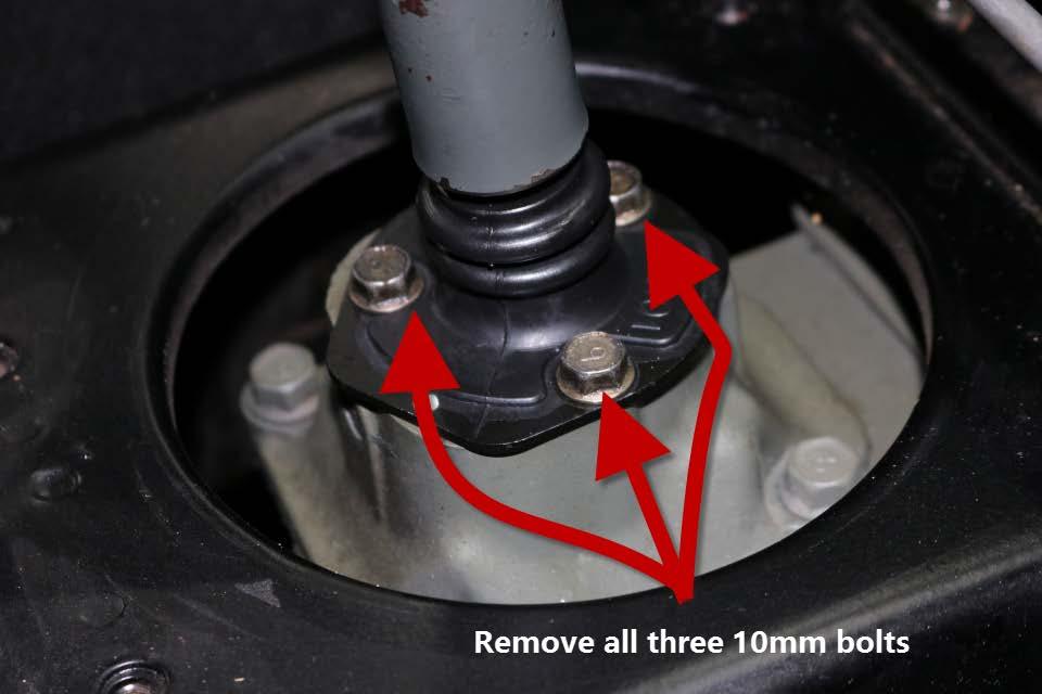1. Remove the shift knob by unscrewing it counter-clockwise 2. Remove the center console by locating the 5 screws and removing them.