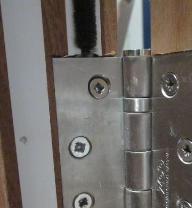 If the leaf or frame can no longer act as an adequate fixing point at the existing screw locations, a section of timber may be replaced in either the door leaf or frame, provided that timber of an