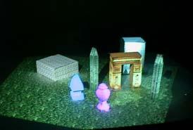 blocks with textures projected from two DLP projectors mounted on the