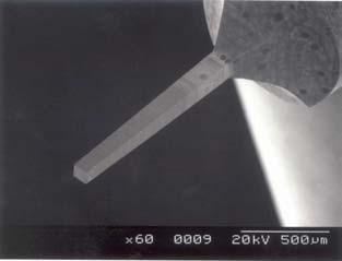 machining using the vibration table. Fig.9 shows a view of the micro tool applied to micro drilling.
