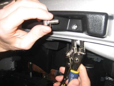 Insert a bolt/washer assembly through inner fl are piece and fender and secure with 5/16 Nylok Nut.
