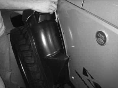 Thoroughly clean the exposed metal fender with a damp cloth and dry.