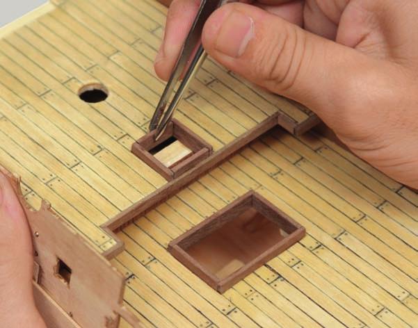 When gluing them into place, ensure that the strip extends 4 mm above the deck.