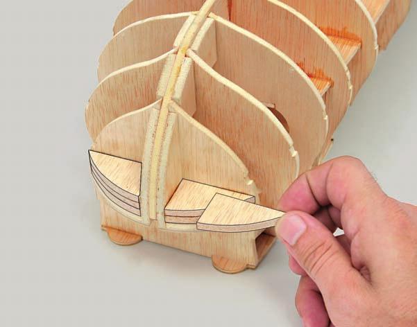 Pencil Wood glue Sandpaper Scissors a Glue the six bow