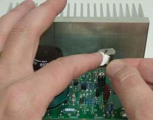 Tighten all the mounting screws as you make sure that the LM3886 is