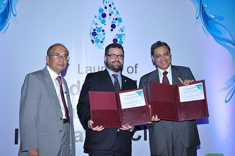 Dr Brent Wootton of Canada India Water Training Consortium signing