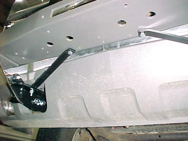 The Braces shown in Photo 8 are required when a winch is being mounted. The forward ends attach in different ways depending on which Winch Carrier is used.
