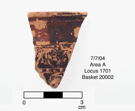 A first century glass shard of a decorated plate. Locus 1702 South of Locus 1701 is Locus 1702.
