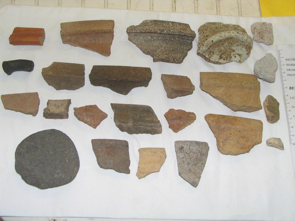 Locus 1704, Iron Age IIa shards of pottery, notice the red slip and