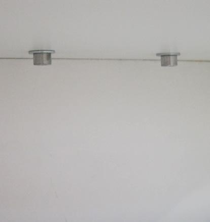 holes on top of the credenza. IMAGE C 4.